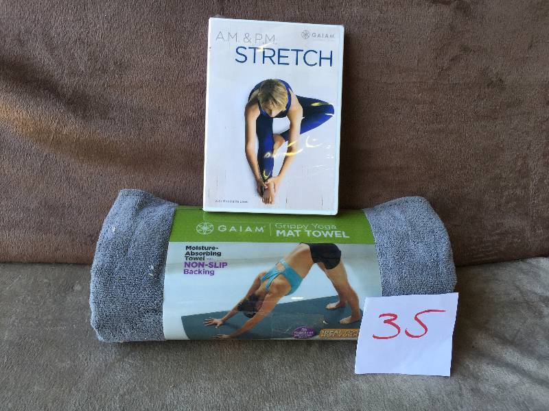 lot 35 image: Yoga Mat Towel and Strech CD
