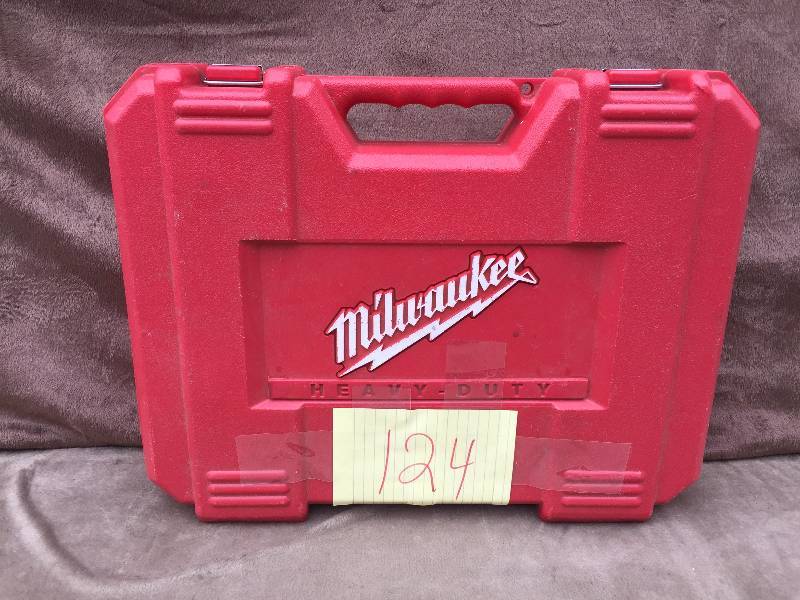 lot 124 image: Milwaukee Drill and Flashlight 14 Volts