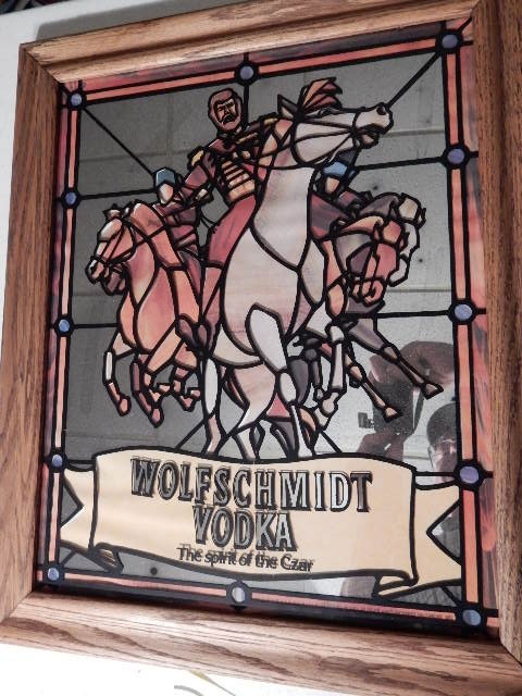 lot 25 image: Wolfschmidt Vodka.  Mirrored and Faux Stained Glass.