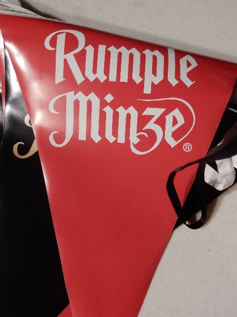 lot 64 image: Pabst Blue Ribbon and RUMPLE MINZE Pennant Strings.. Each approx 20 feet