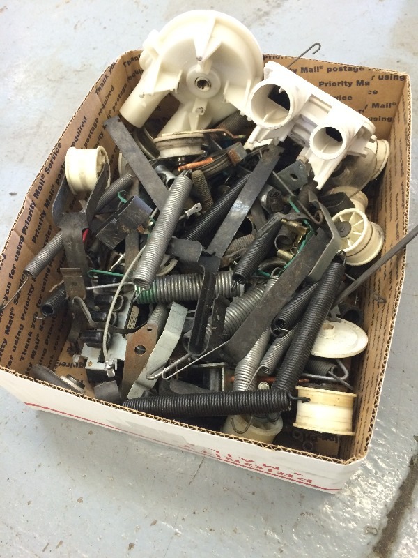 lot 58 image: Large assortment of appliance tension springs. Pumps and misc parts, hardware