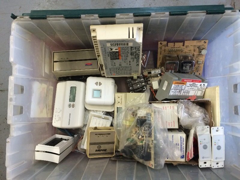 lot 92 image: Assorted Thermostats, Ignition Modules and circuit boards