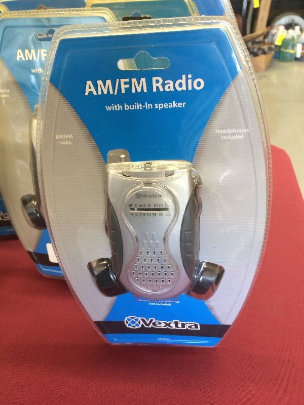 lot 95 image: Vextra  VX2093  AMFM Radios with headphones  lot of 8.