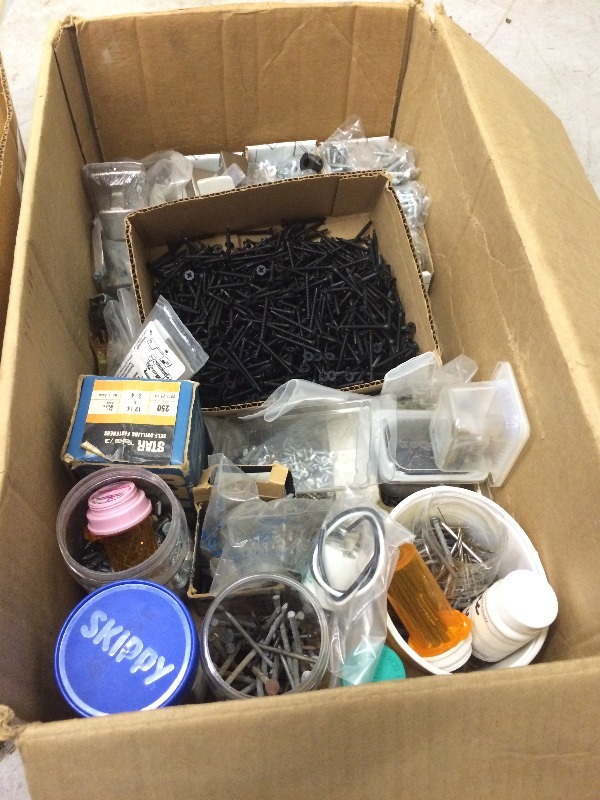 lot 99 image: Large lot of new mounting screws and hardware  new ice machine manifolds