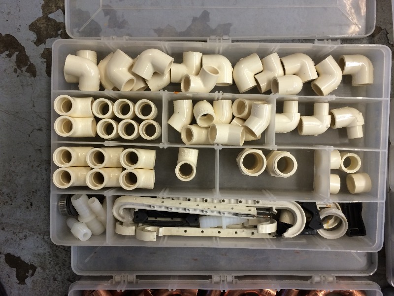 lot 119 image: Organizers full of Assorted pvc & copper fittings,  misc electrical fittings & components  3 organizers and holding case