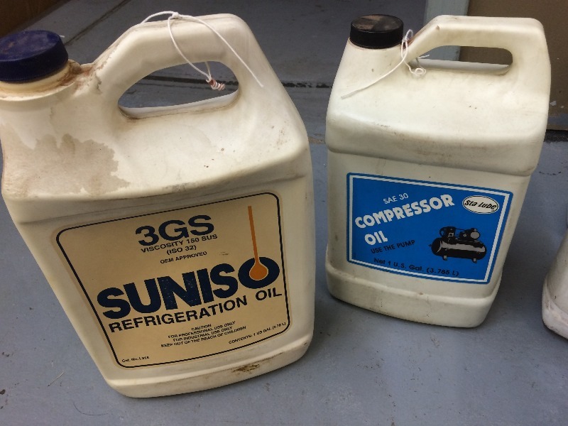 lot 130 image: Assorted lot of refrigeration compressor oil, glycol, coil cleaners, degreaser lot of 10