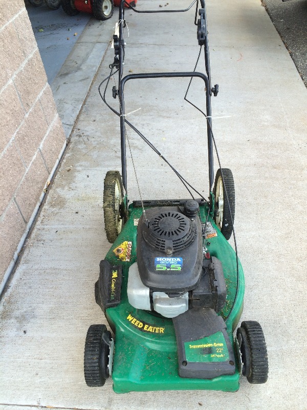 lot 136 image: Paulan  WEEDEATER Lawnmower 22 cut   front wheel drive  Runs