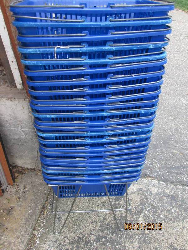 Stack of plastic shopping baskets...