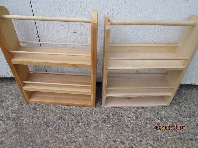 2 wooden shelf racks with hanging b...