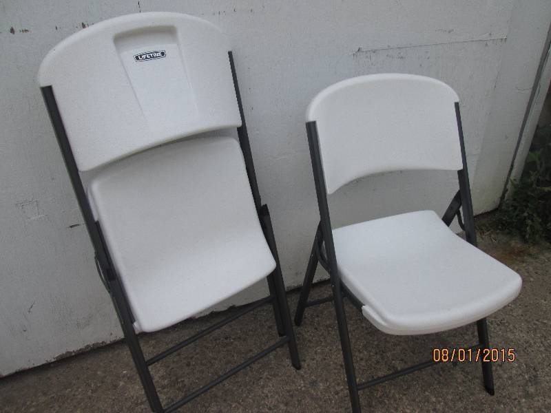 2 Lifetime folding plastic chairs i...