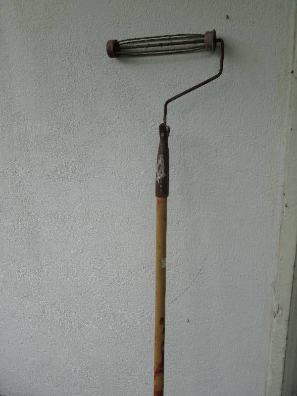 Long handled paint roller...