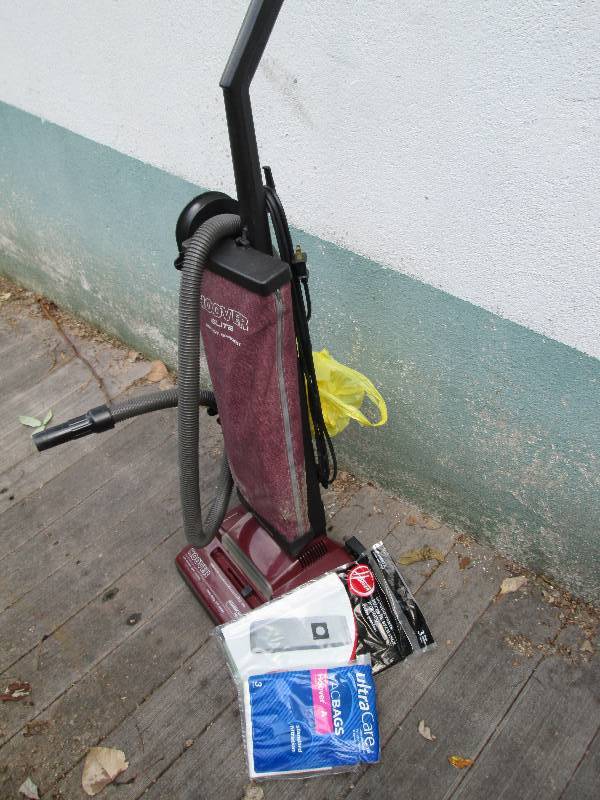 Hoover vacuum with replacement bags...