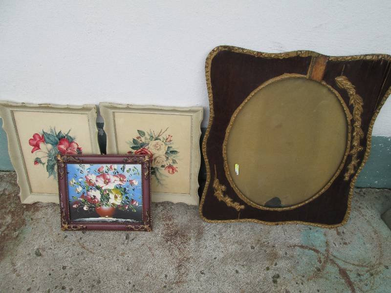 Lot of art and a vintage wood frame...