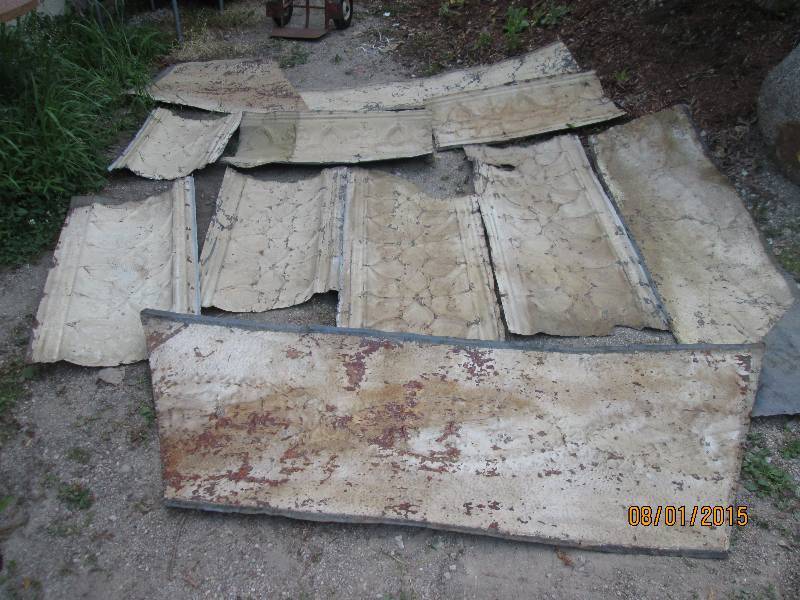 lot 1 image: Pile of assorted ceiling tin panels...