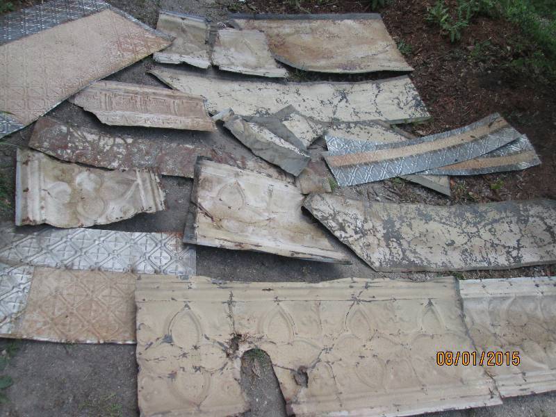 lot 2 image: Pile of assorted ceiling tin panels...