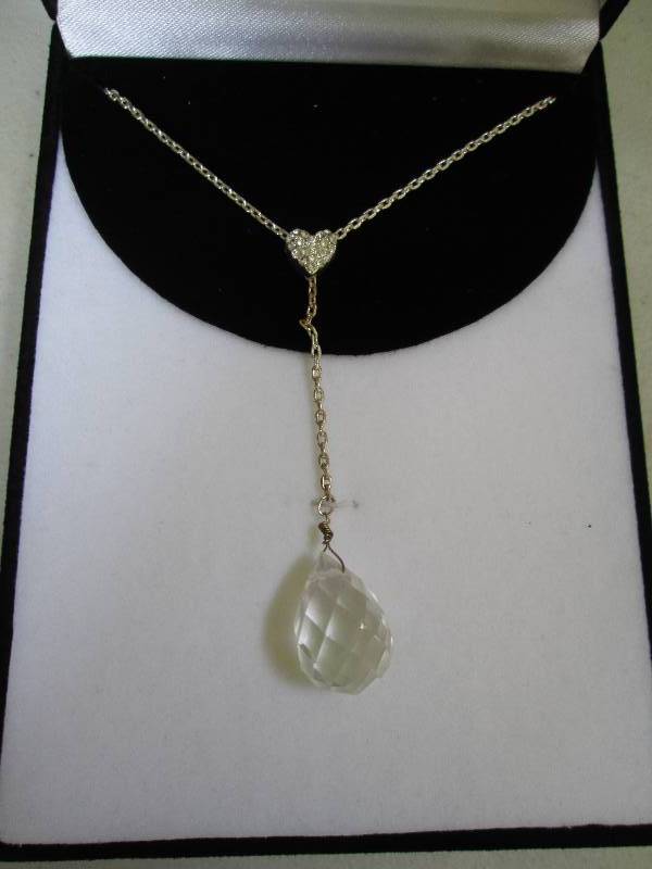 Clear necklace, new in box...