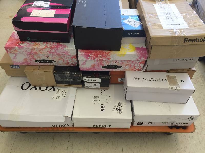pallet of 50 new pairs of shoes