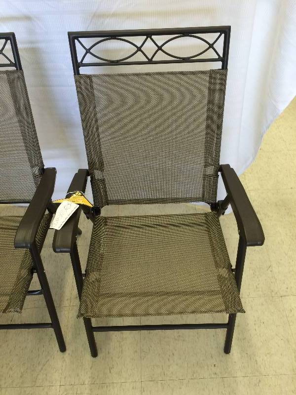 two New  fold up patio chairs