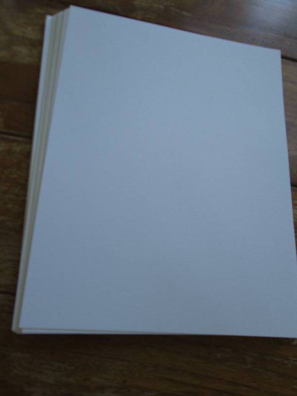 lot of white scrapbook paper ...