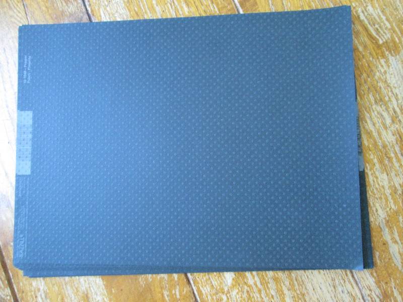 lot of black dotted scrapbook paper...