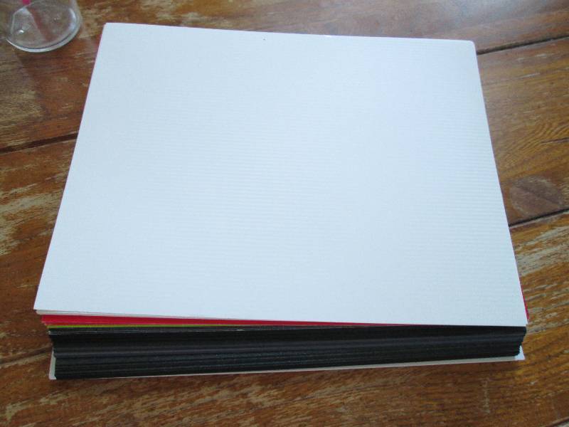 lot of beach themed scrapbook paper...