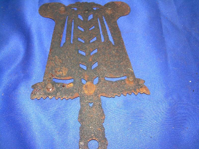 antique cast iron trivets