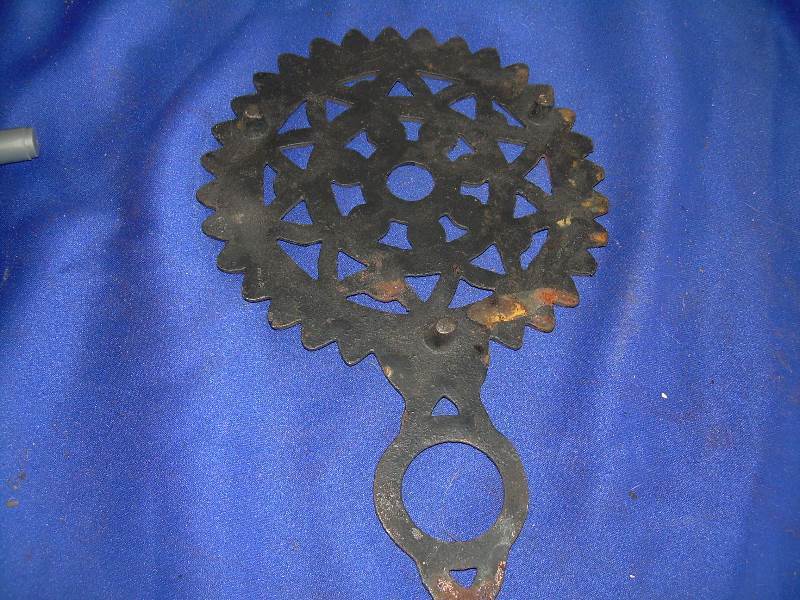 antique cast iron trivet