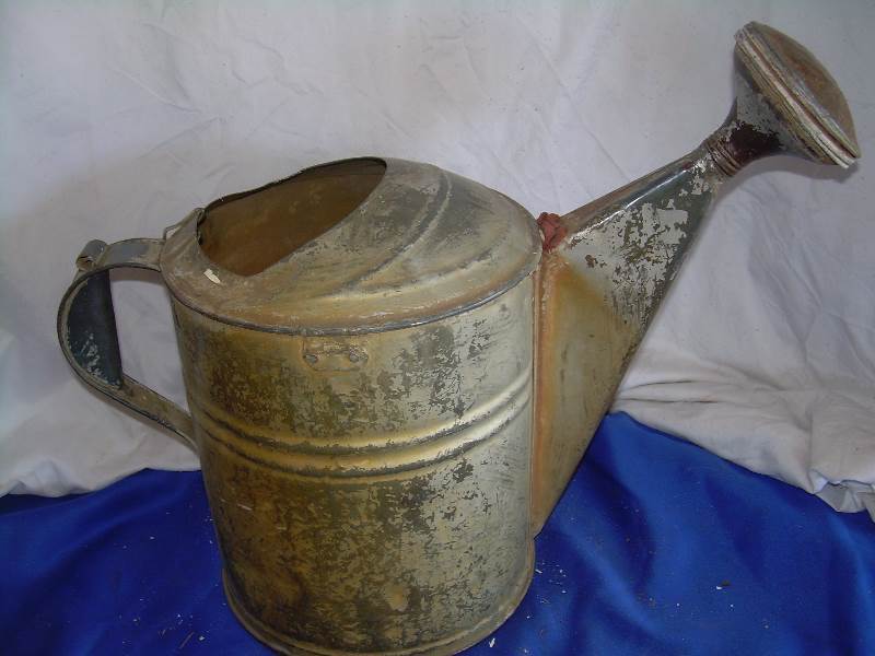 Antique watering can