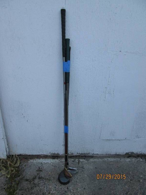 4 golf clubs including graphite sha...