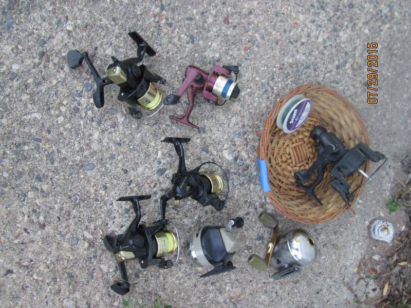 Fishing reel lot...