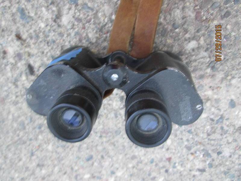 Binoculars with leather strap...