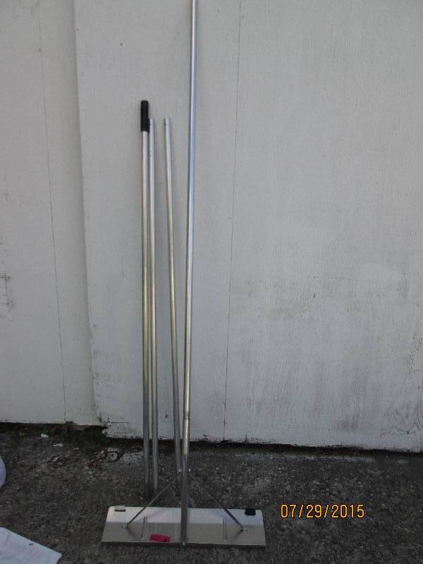 Roof shovel with long extending han...