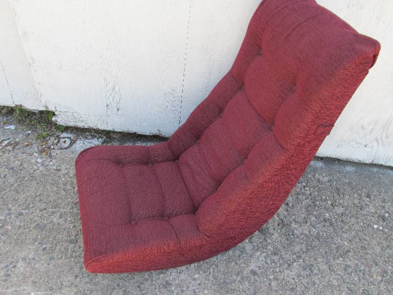 Burgundy soft chair, rocks...