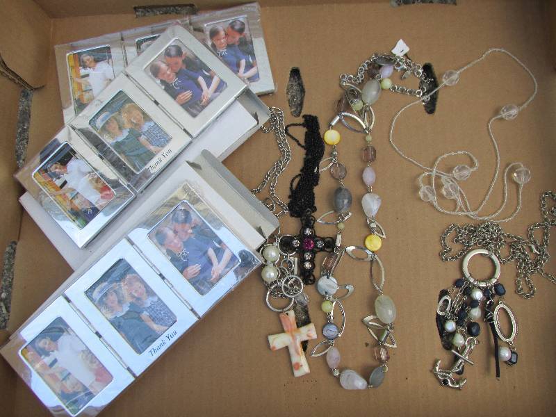Lot of jewelry and new picture fram...