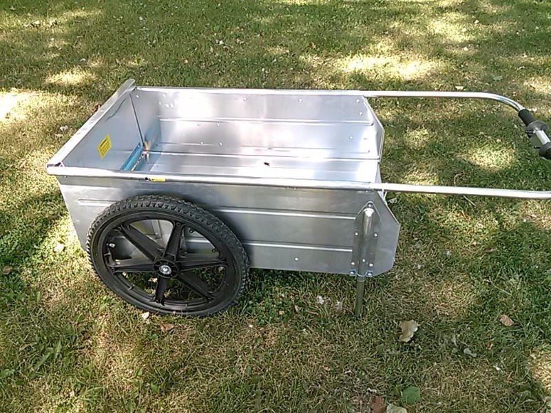 BRAND NEW NEVER USED FOLDING ALUMINUM YARD CART-300 LB CAPACITY