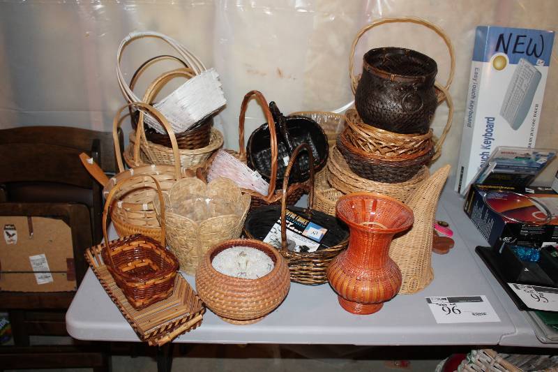 lot 96 image: Table Lot Including Wicker Baskets Decorative  Vase Wicker Serving Tray And More.