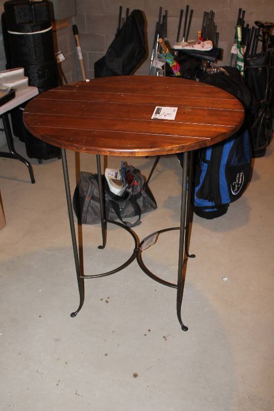 lot 78 image: Circular Wooden Table wMetal Frame 36 Diameter 41 Height.