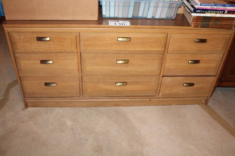 lot 136 image: Wooden Dresser Cabinet 9 Drawers wHandles 18 x 62 x 30.