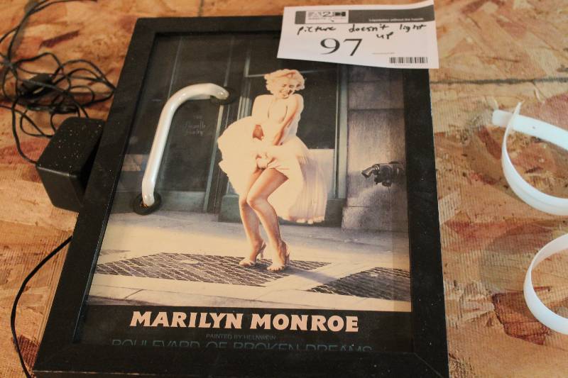lot 97 image: Marilyn Monroe Light-Up Sign wCord Picture Doesnt Light Up.