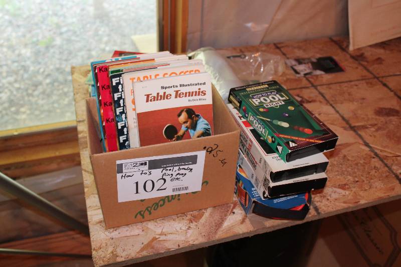 lot 102 image: Box Lot of How-To Tutorials Including Racquet & Paddle Sports Table Tennis Table Soccer And More.