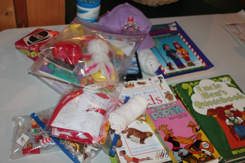 lot 147 image: Half Table Lot Including Kids Popeye Video Kids Book Kids Toys And More.