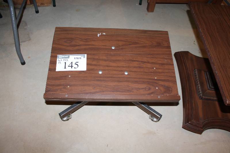 lot 145 image: Wooden Table wMetal Base & Wheles 16 x 24 x 13.