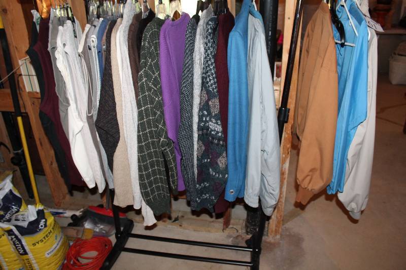 lot 161 image: Clothes Rack Lot Including Sweaters Jackets Vests And More.