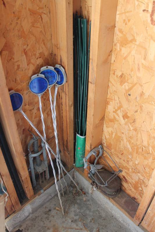 lot 55 image: Lot of (2) Including Animal Traps Stakes wReflectors, Blue Stakes.