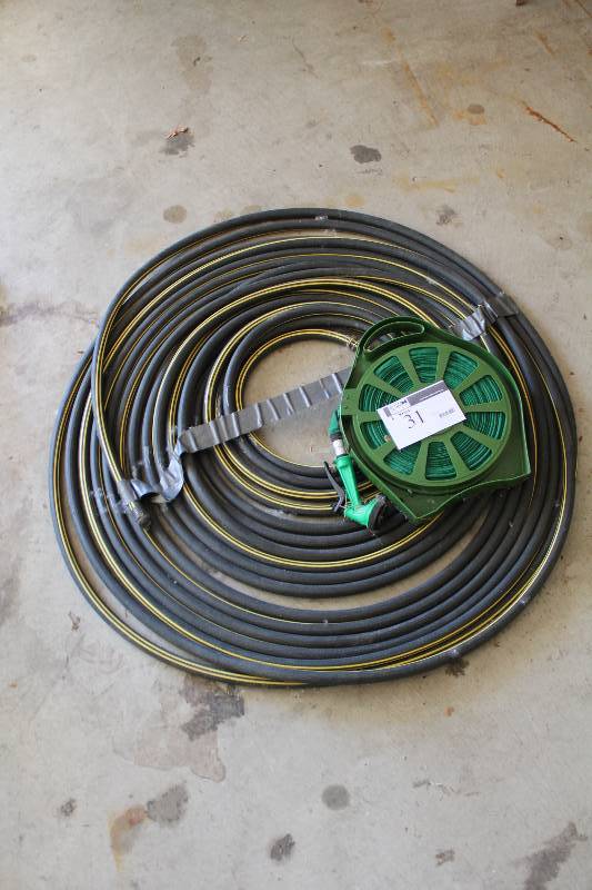 lot 31 image: Lot of (2) Garden Hoses wAttachments.