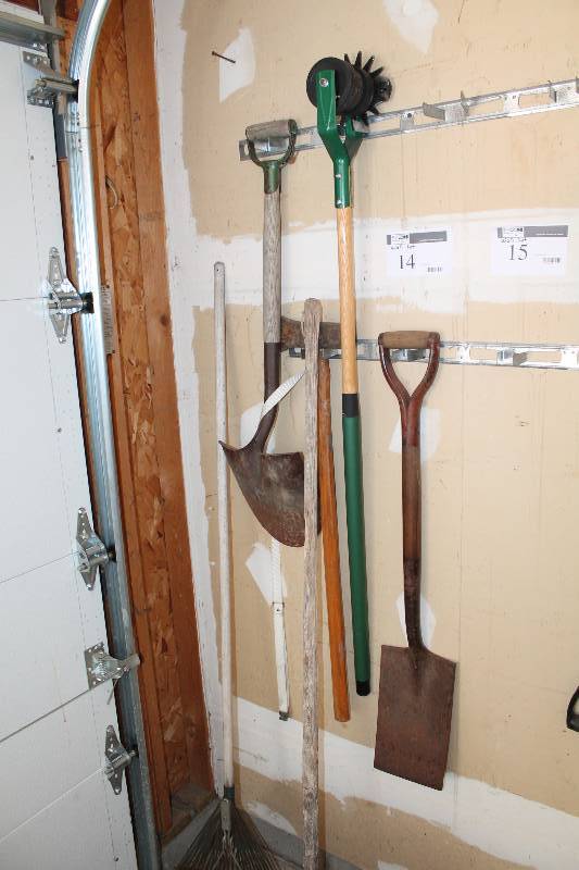 lot 14 image: Wall Lot Including Rake Shovels (2) Lawn Aerator And More.