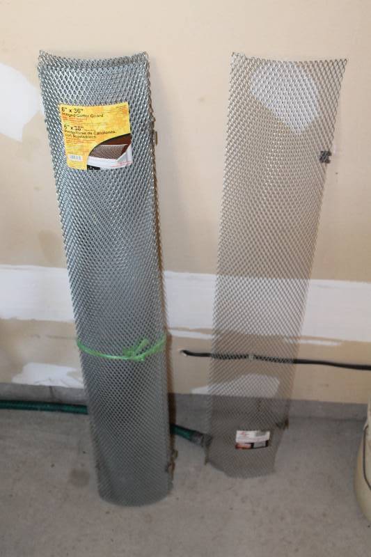 lot 23 image: Lot of (7) Metal Grate Gutter Guards 6 x 36.