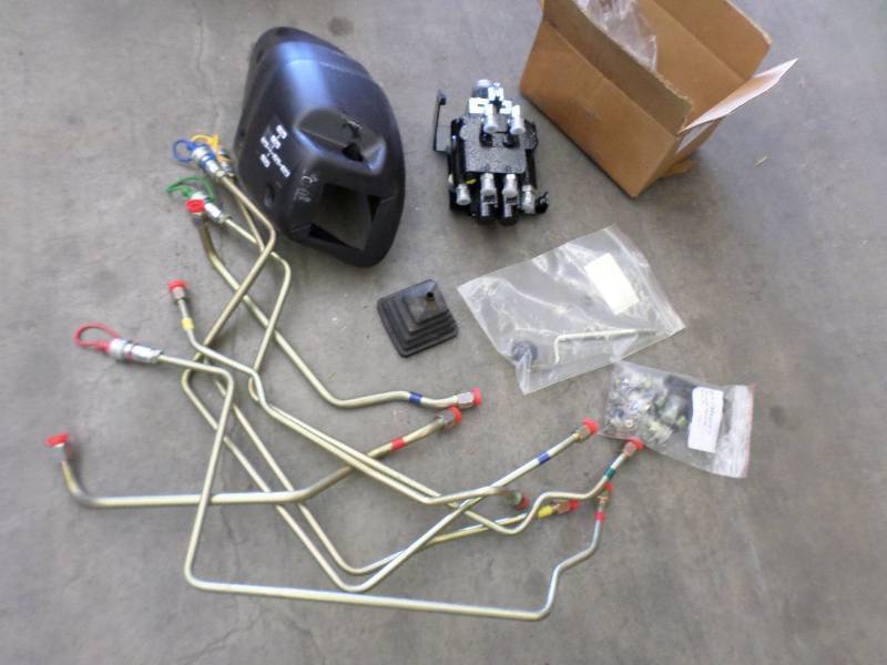 lot 7 image: Unused Tractor Loader Control Assem...
