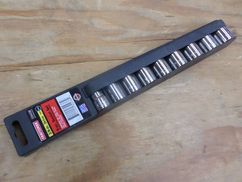 lot 76 image: New Craftsman 9-Piece 38-Drive SA...