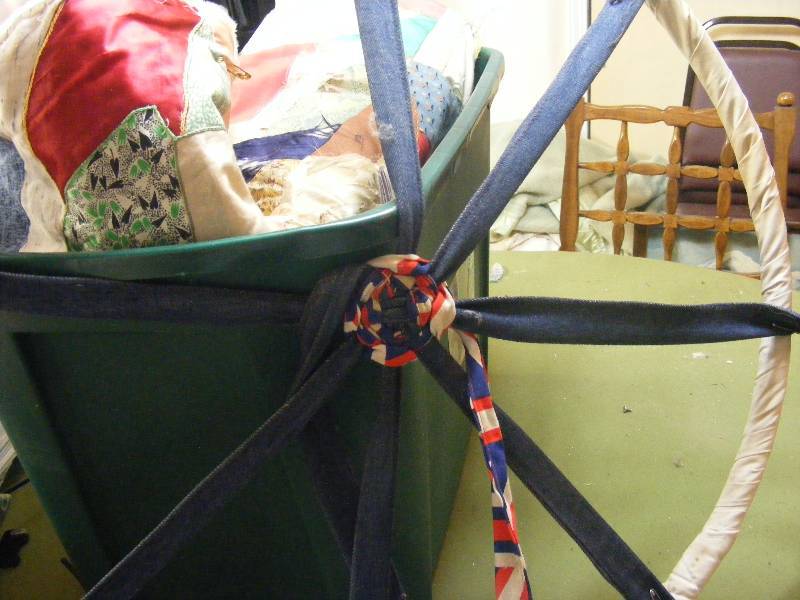 Quilting Work and Iron Wagon Wheel